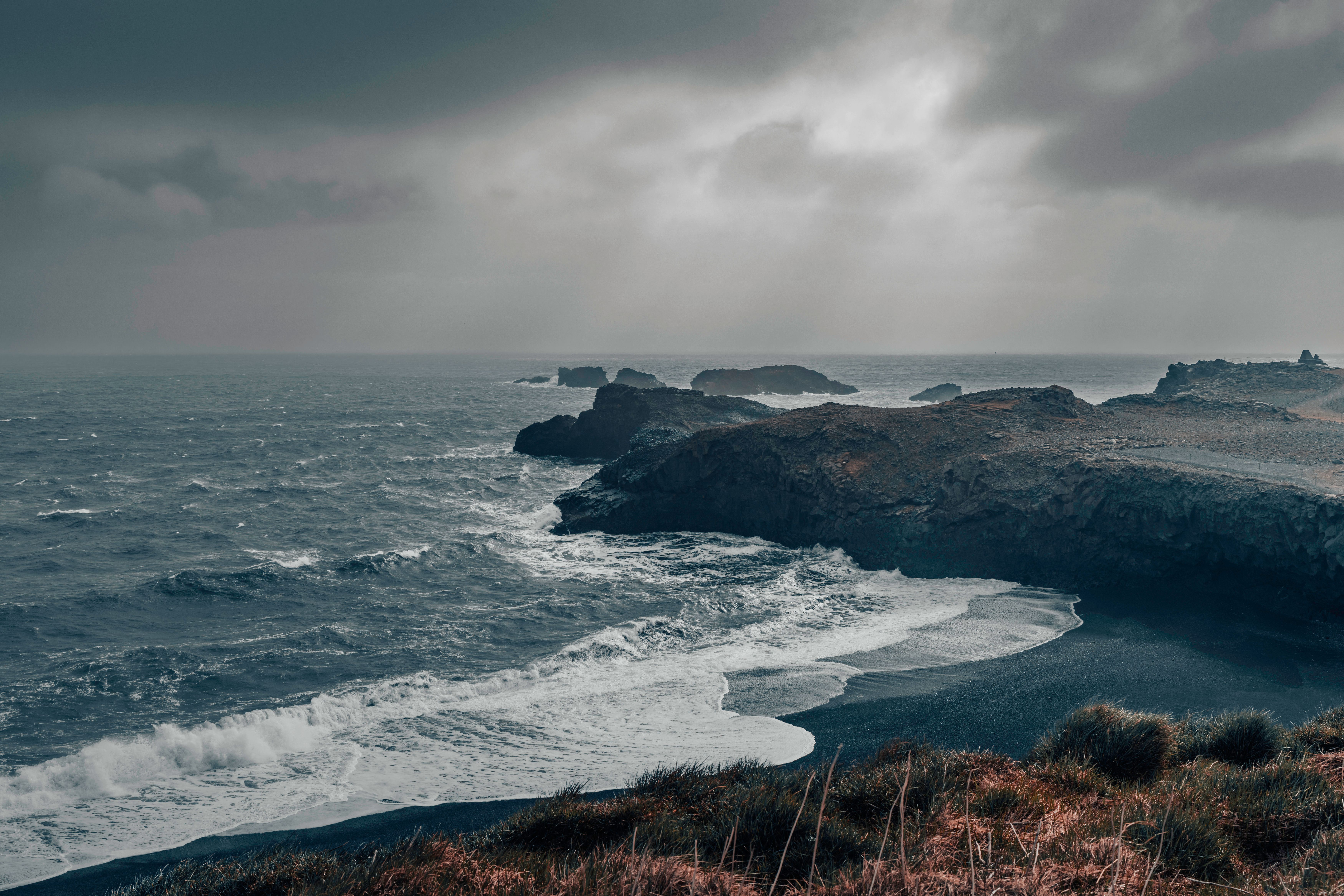 Moody Icelandic coastline with crashing waves