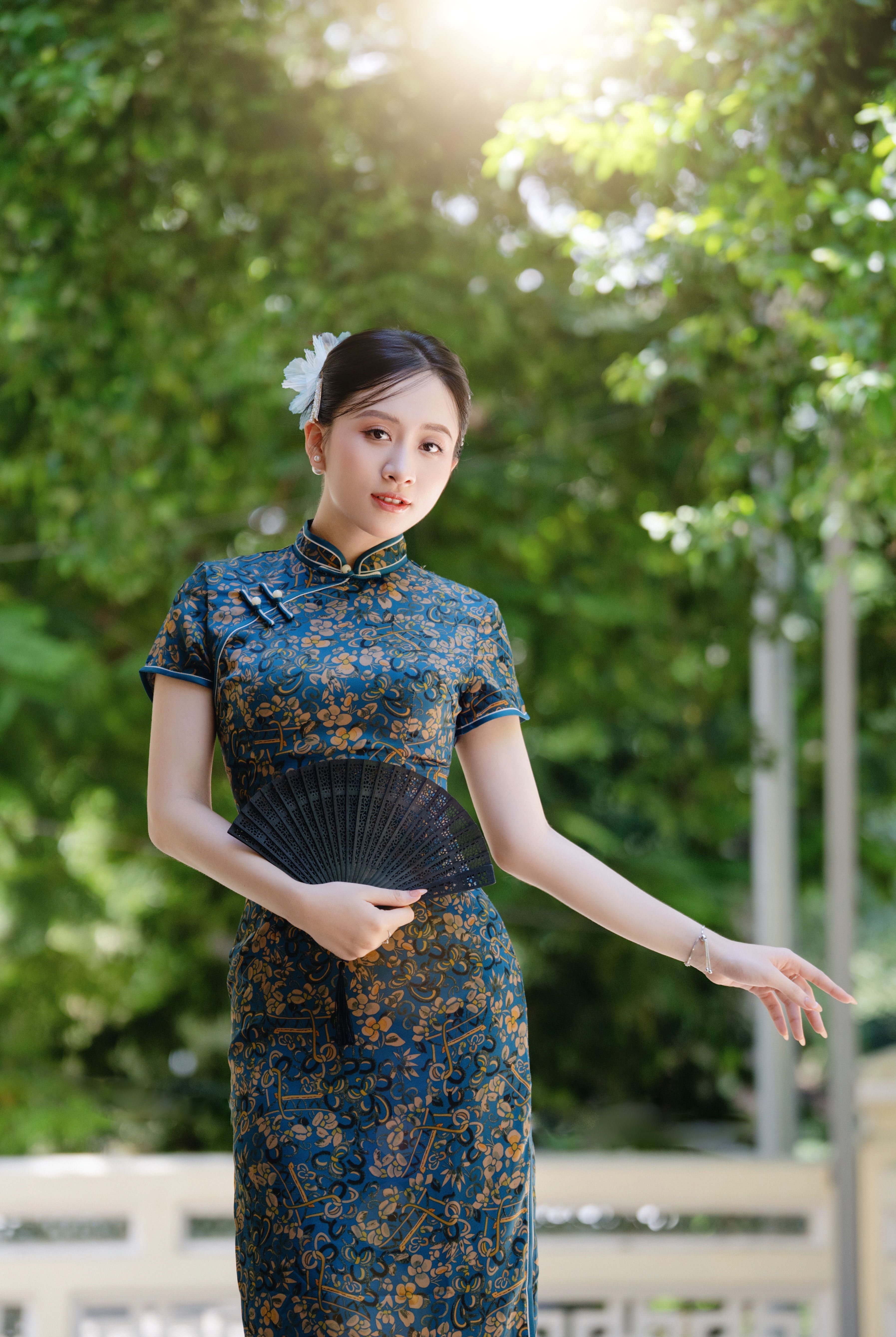 Elegant Woman in Traditional Chinese Dress Outdoors  Free Stock Photo