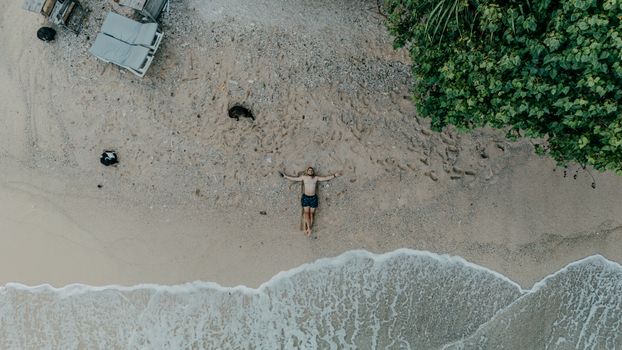 Discover tranquility at a secluded beach in Sri Lanka from an aerial perspective, capturing nature's beauty.