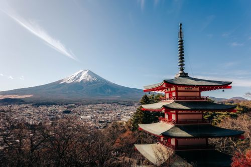Free A breathtaking view of Mount Fuji alongside the iconic Chureito Pagoda under a clear sky. Stock Photo