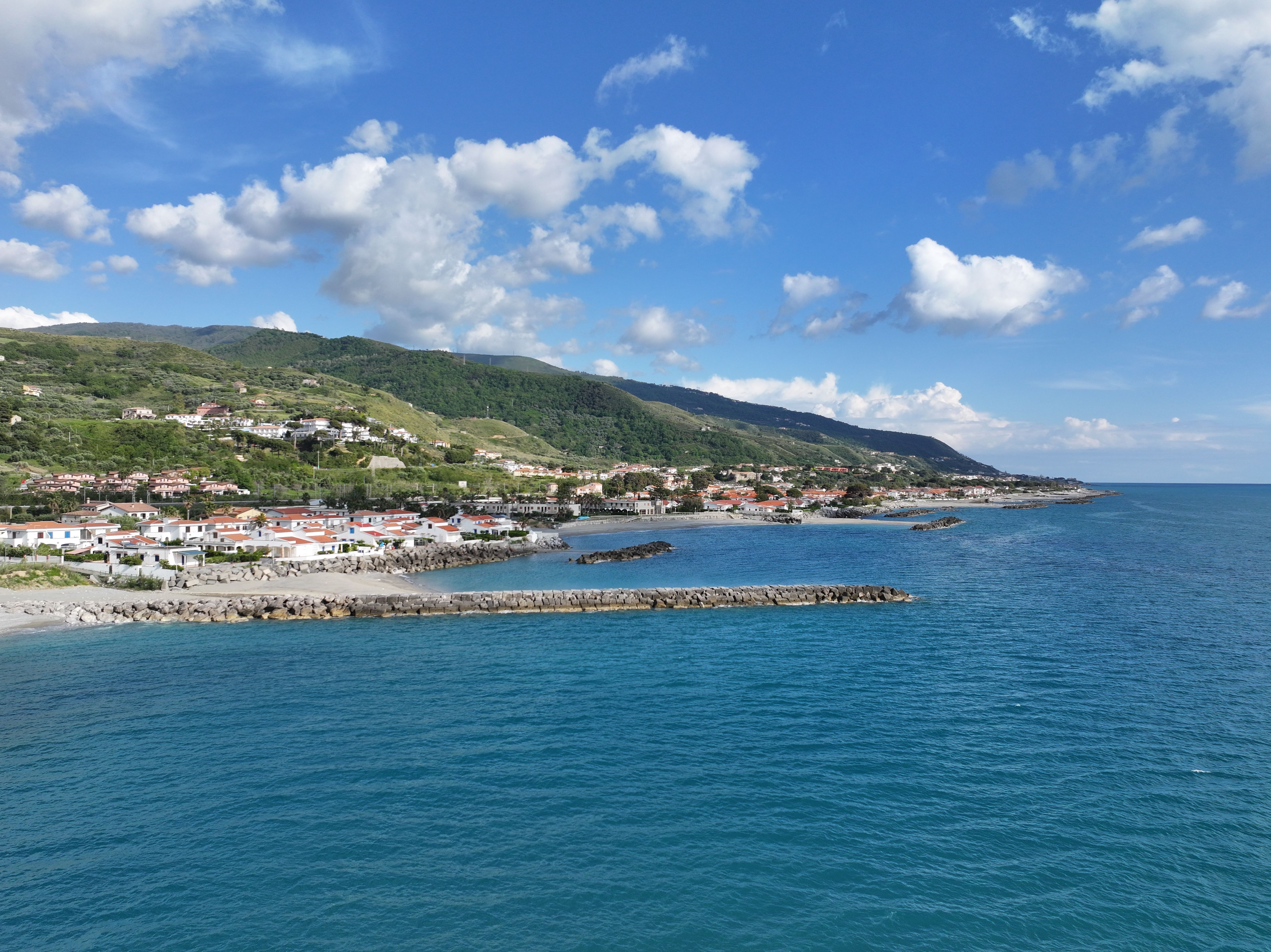 Coastal Town with Scenic Ocean and Hillside View · Free Stock Photo