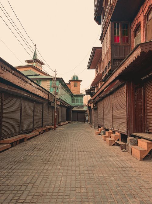 Free Explore the vintage architecture and cobblestone streets of Srinagar's historic old city. Stock Photo