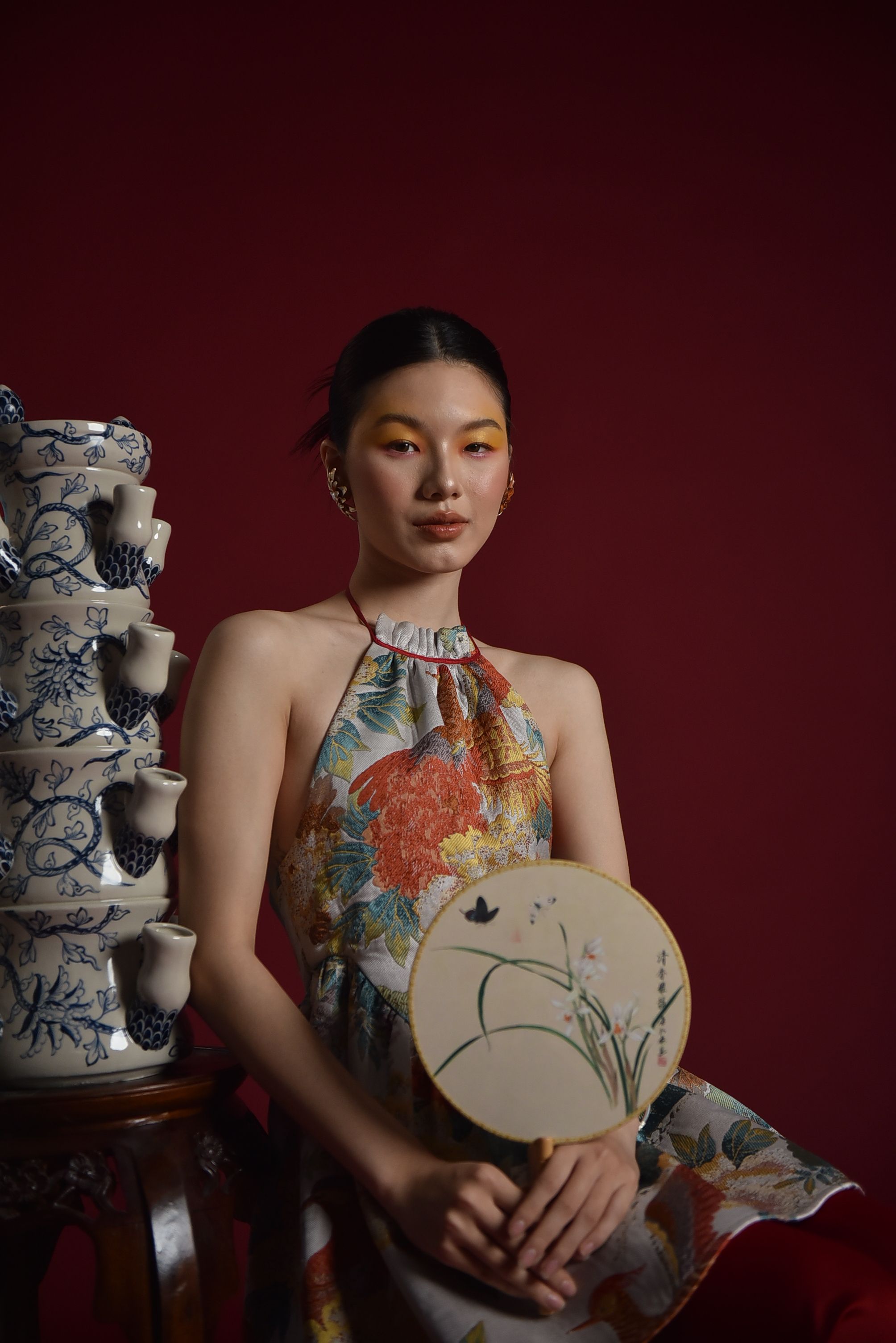 Elegant Portrait of Woman in Floral Dress with Fan · Free Stock Photo