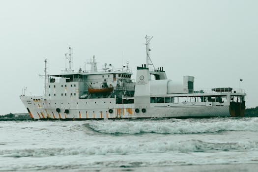 Large cargo ship navigating the Arabian Sea near Kochi, Kerala, India.