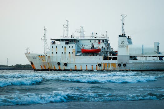 A large cargo ship navigating the Arabian Sea near Kochi, Kerala, India.