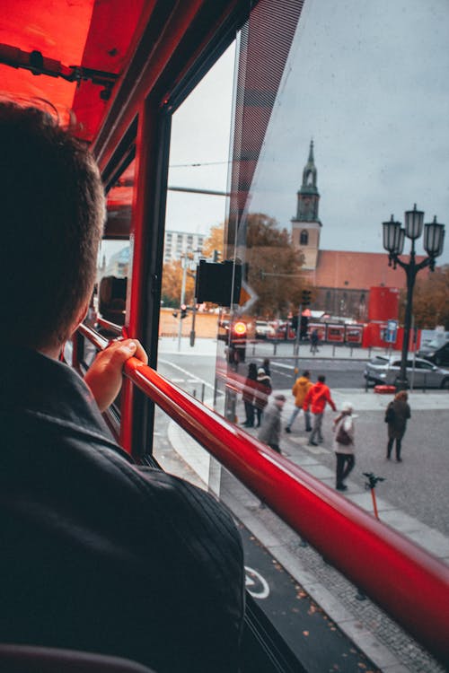 Person Sitting Near the Window