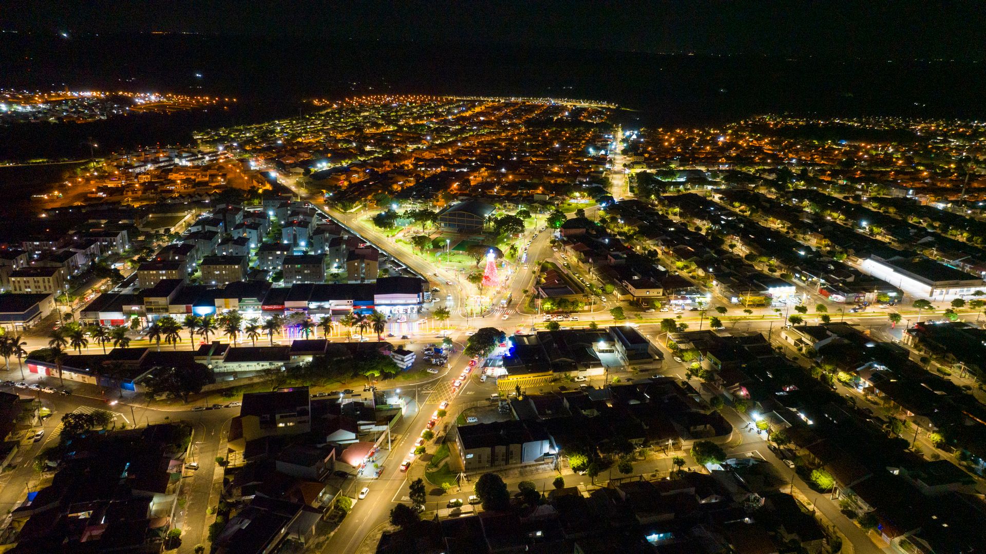 Stunning aerial view of Londrina, Brazil at night showcasing vibrant city lights.