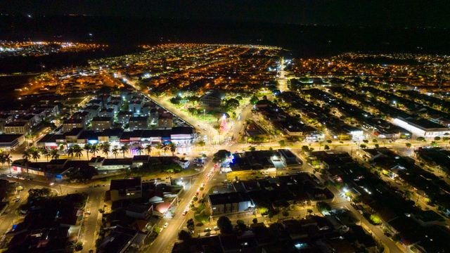 Stunning aerial view of Londrina, Brazil at night showcasing vibrant city lights.