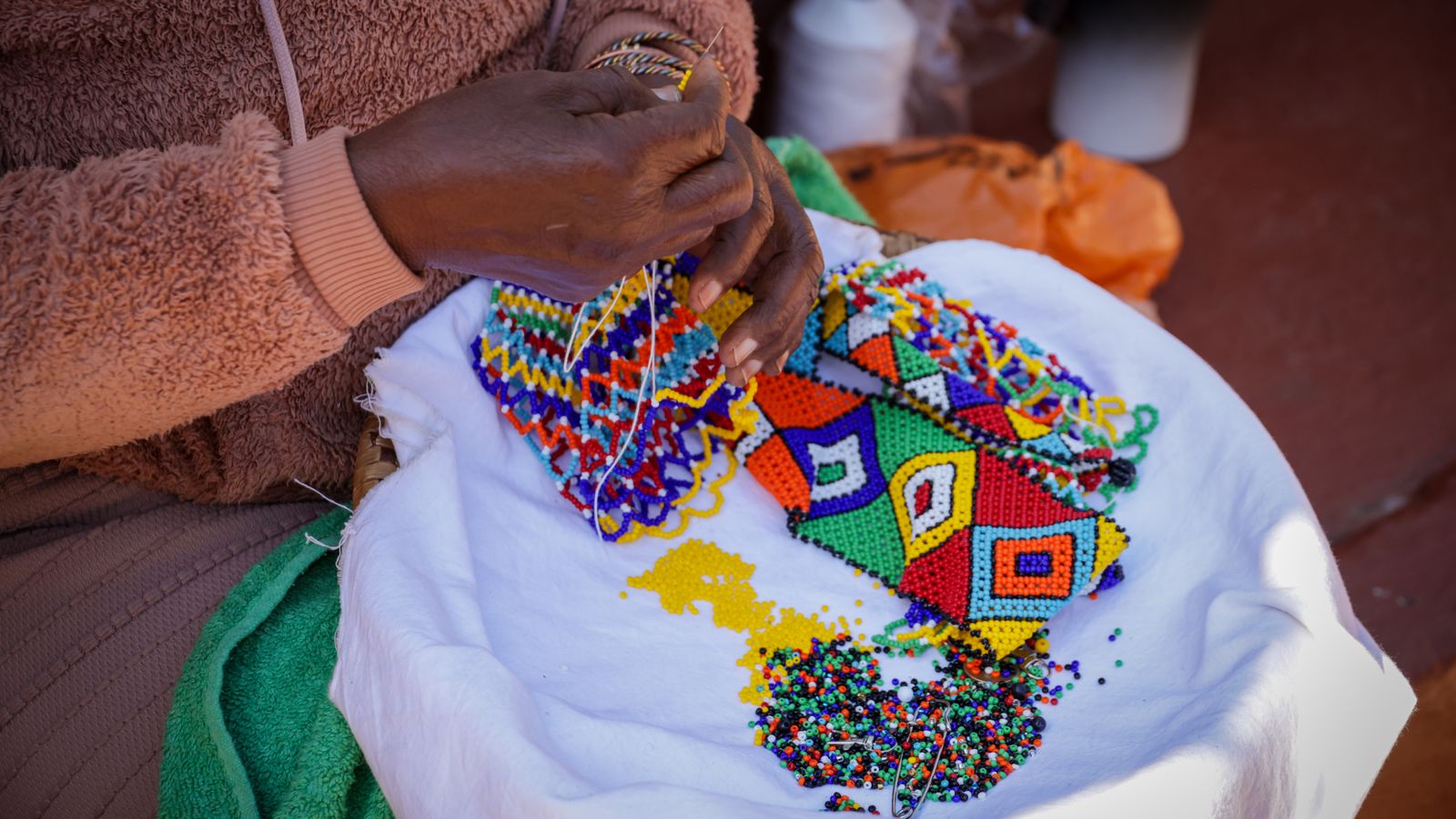 Colorful handcrafted beaded art in progress, Eswatini