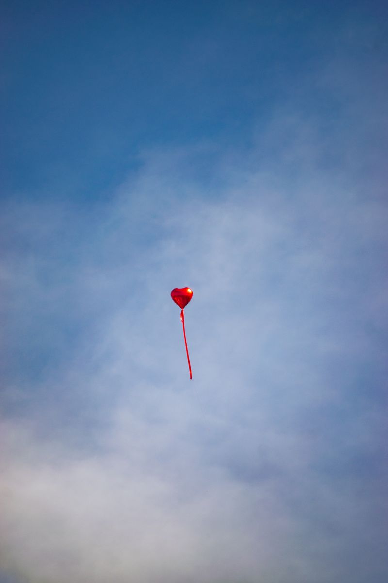 Red Balloon in the Sky · Free Stock Photo