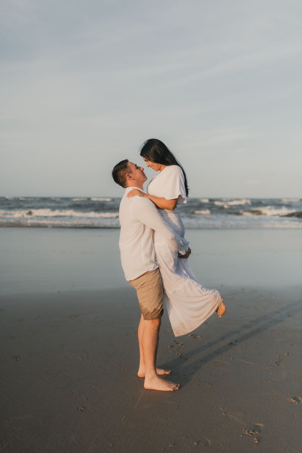 Romantic Couple Embracing on Beach at Sunset · Free Stock Photo