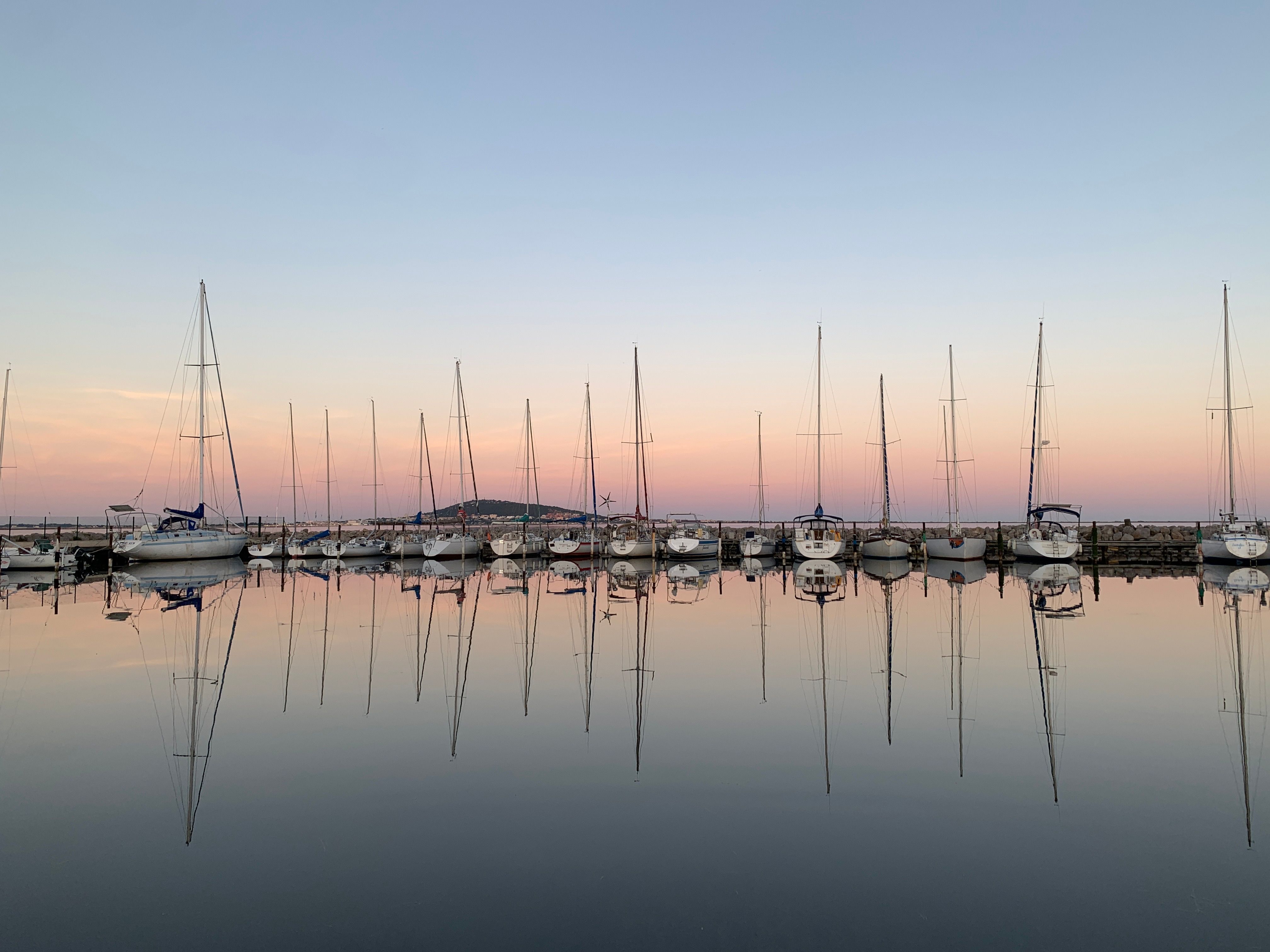 Tranquil Marina at Sunset with Sailboats · Free Stock Photo