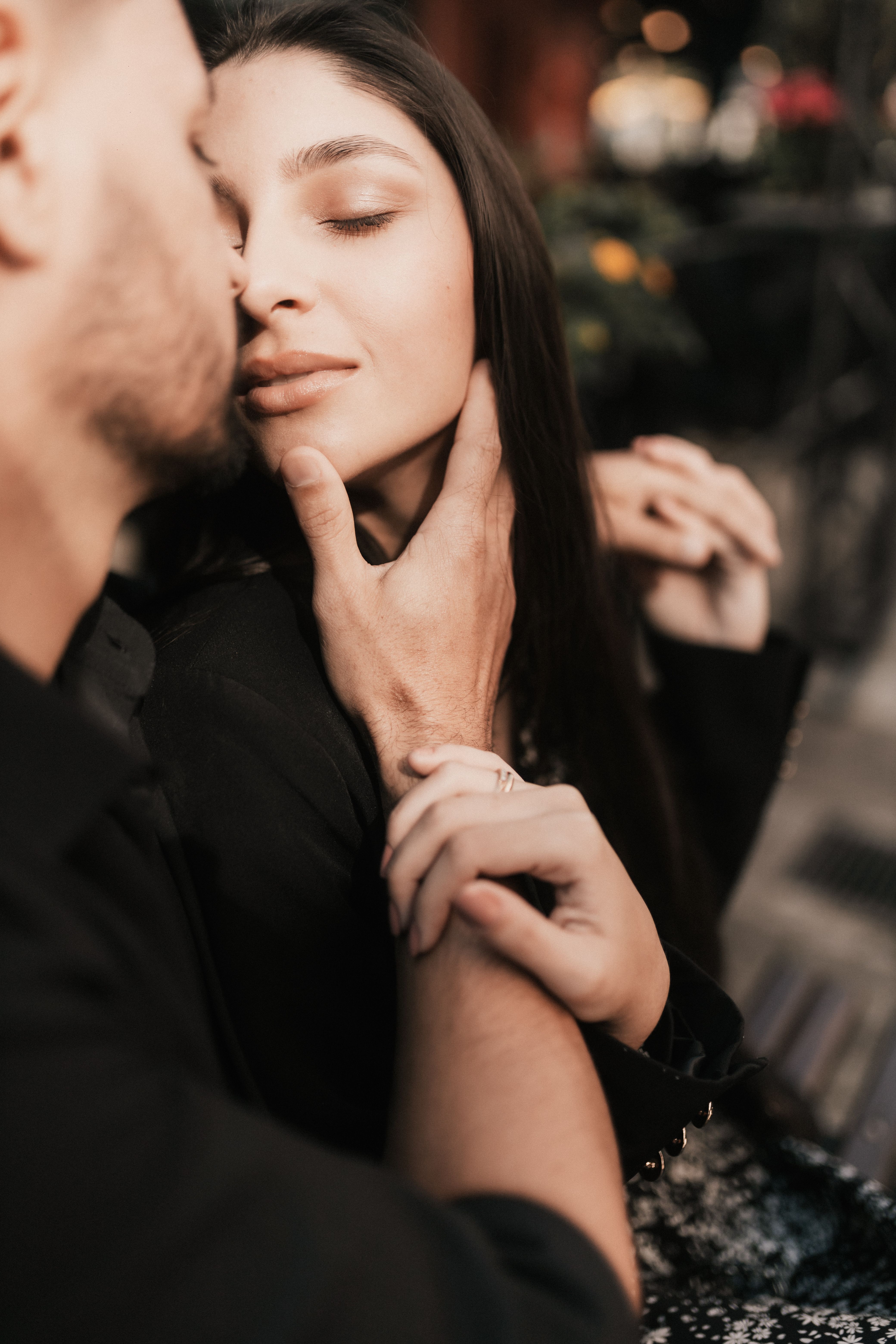 Intimate Couple Embracing in Romantic Setting · Free Stock Photo