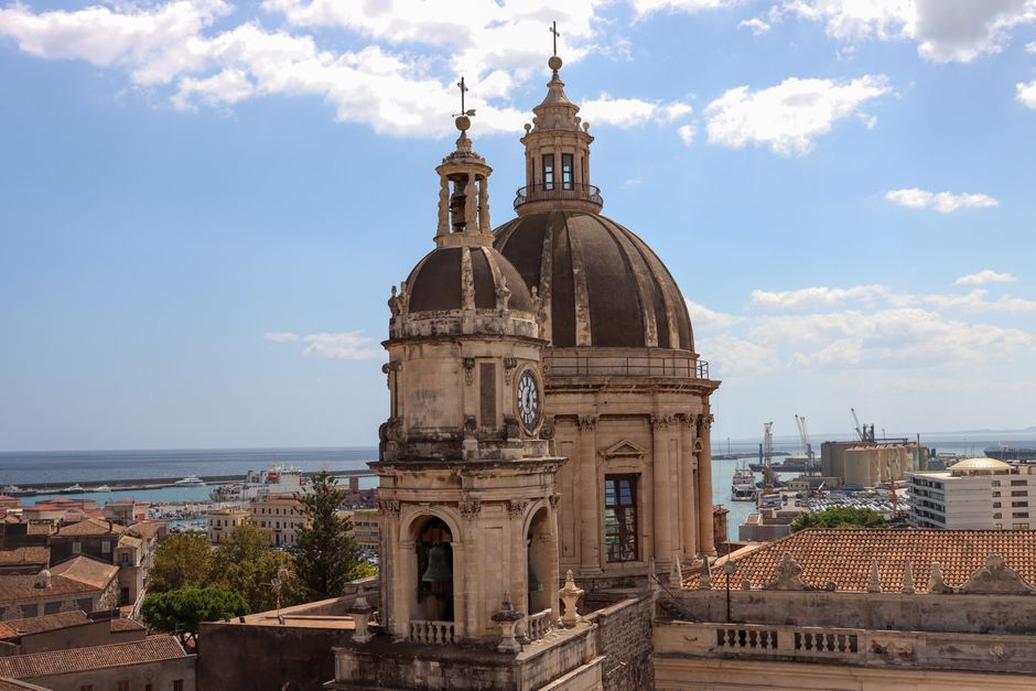 Explore the architectural beauty of Catania Cathedral's dome in Sicily, Italy.