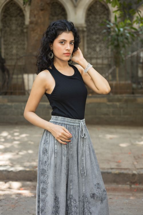 Fashionable Woman Posing Outdoors in Stylish Attire · Free Stock Photo