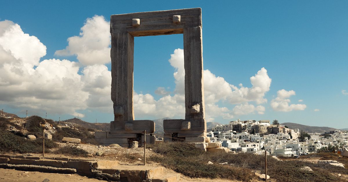 The Portara, a freestanding marble doorway on the islet beside Naxos harbour.
