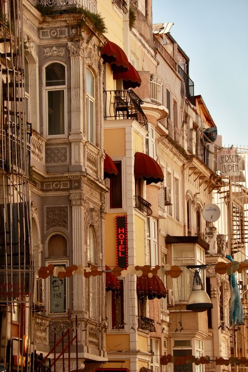 Free Beautiful view of ornate historic European architecture with vibrant awnings. Stock Photo