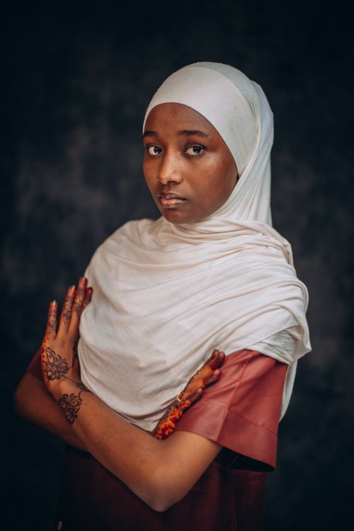 Portrait of Woman in Traditional Hijab with Henna Art · Free Stock Photo