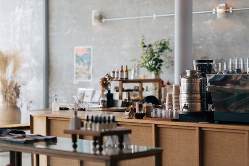 Free A stylish coffee shop interior in Yokosuka, Japan with modern decor and coffee brewing equipment. Stock Photo
