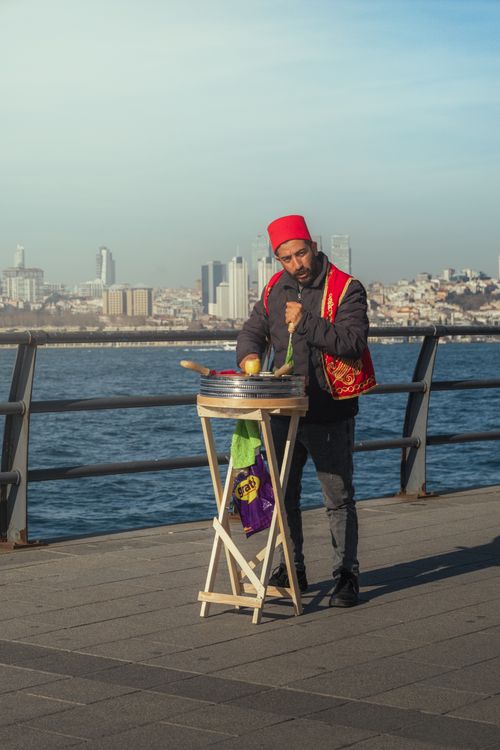 Free Traditional street vendor stirring a pot along the Bosphorus in Istanbul, Turkey. Stock Photo