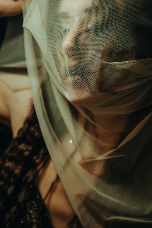 Free Mystical portrait of a woman with a veil, capturing beauty and elegance. Stock Photo