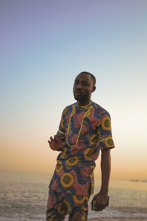 Man Standing Beside Beach