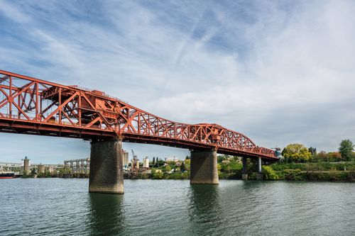 Free Broadway Bridge over the Willamette River in Portland, Oregon, on a clear day. Stock Photo
