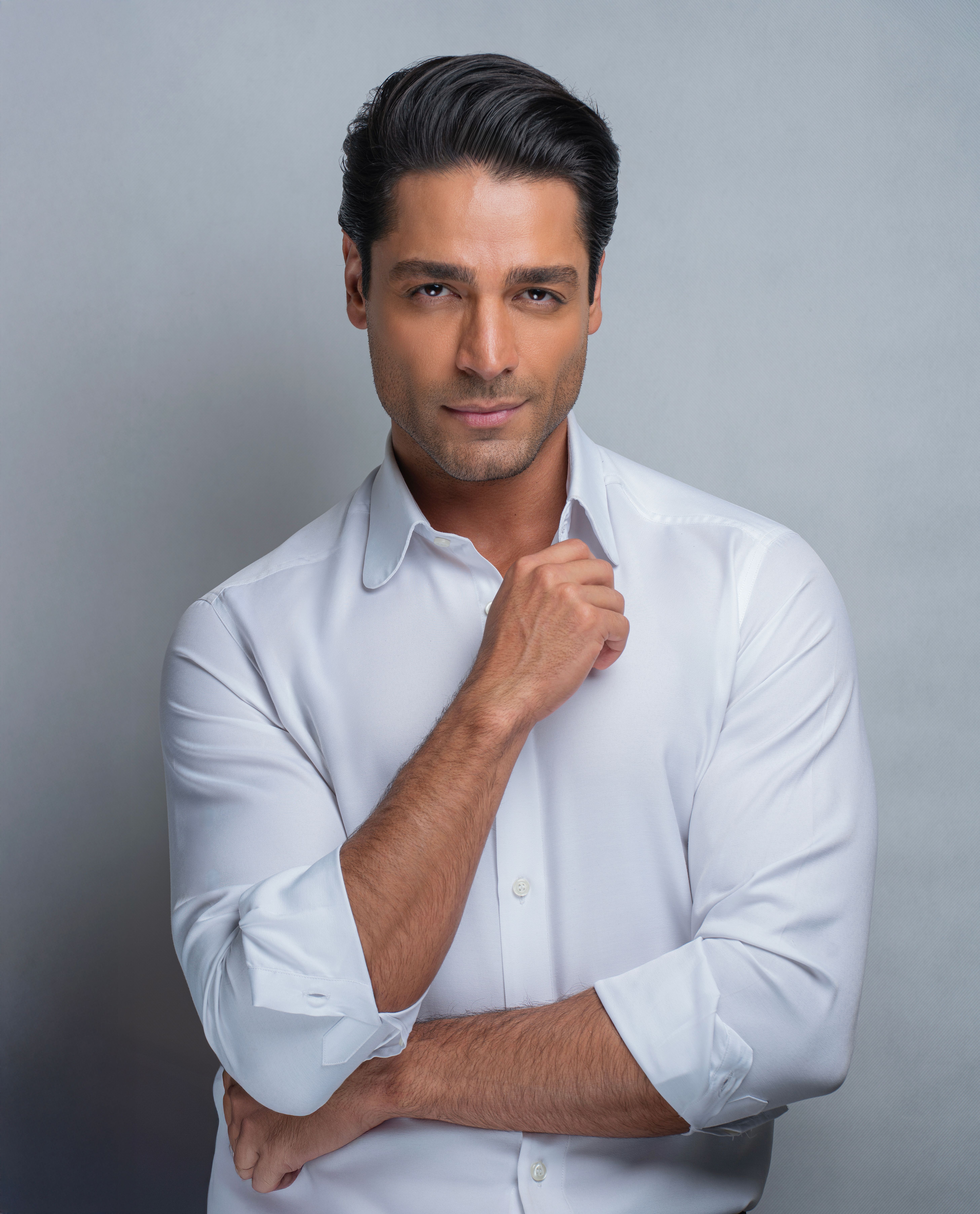 Elegant Portrait of a Man in White Shirt · Free Stock Photo