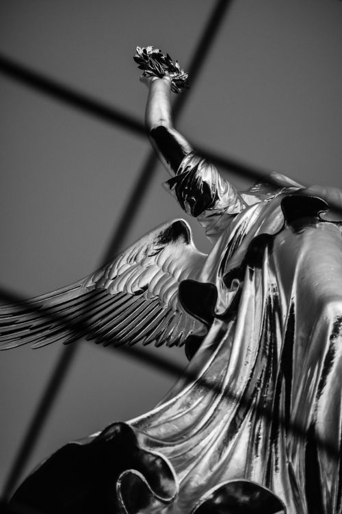 Free Artistic view of Berlin's Victory Column statue's intricate details in black and white. Stock Photo
