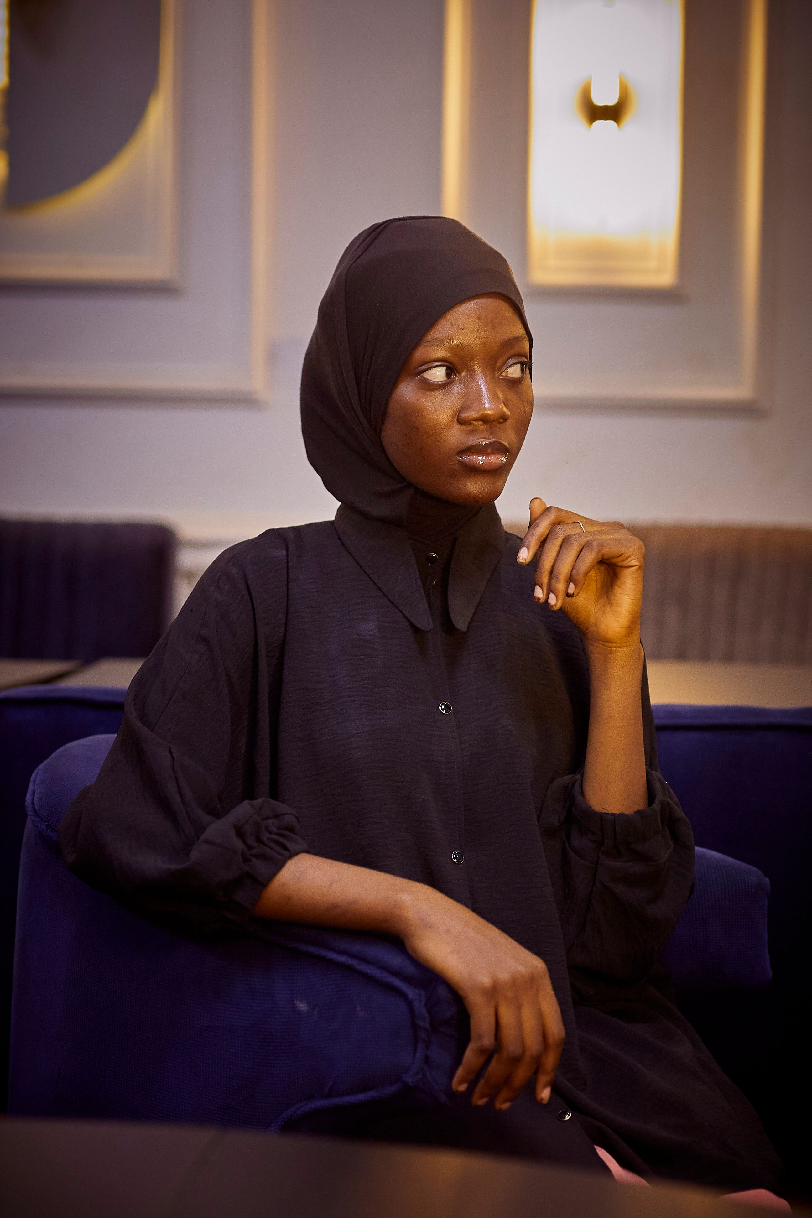 Elegant Portrait of a Woman in a Hijab Indoors · Free Stock Photo
