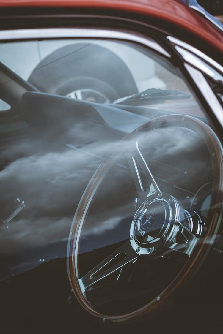 Steering Wheel In Red Retro Car