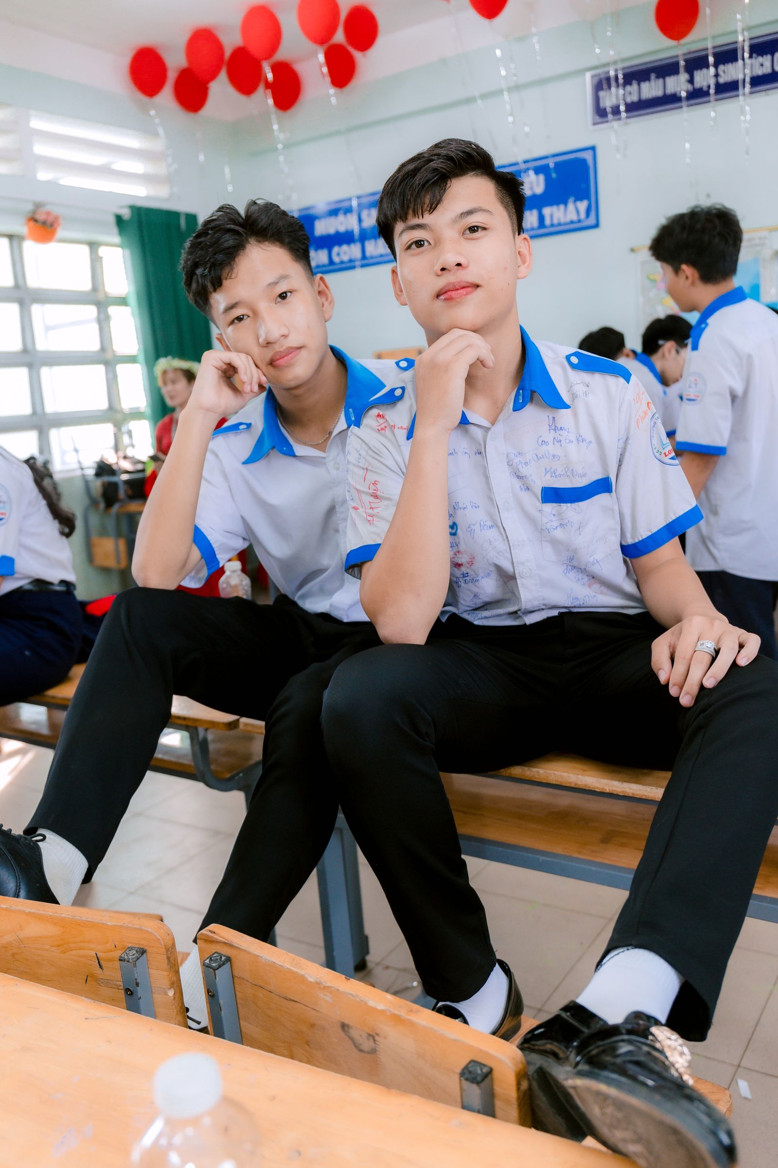 Teen students socializing in a classroom
