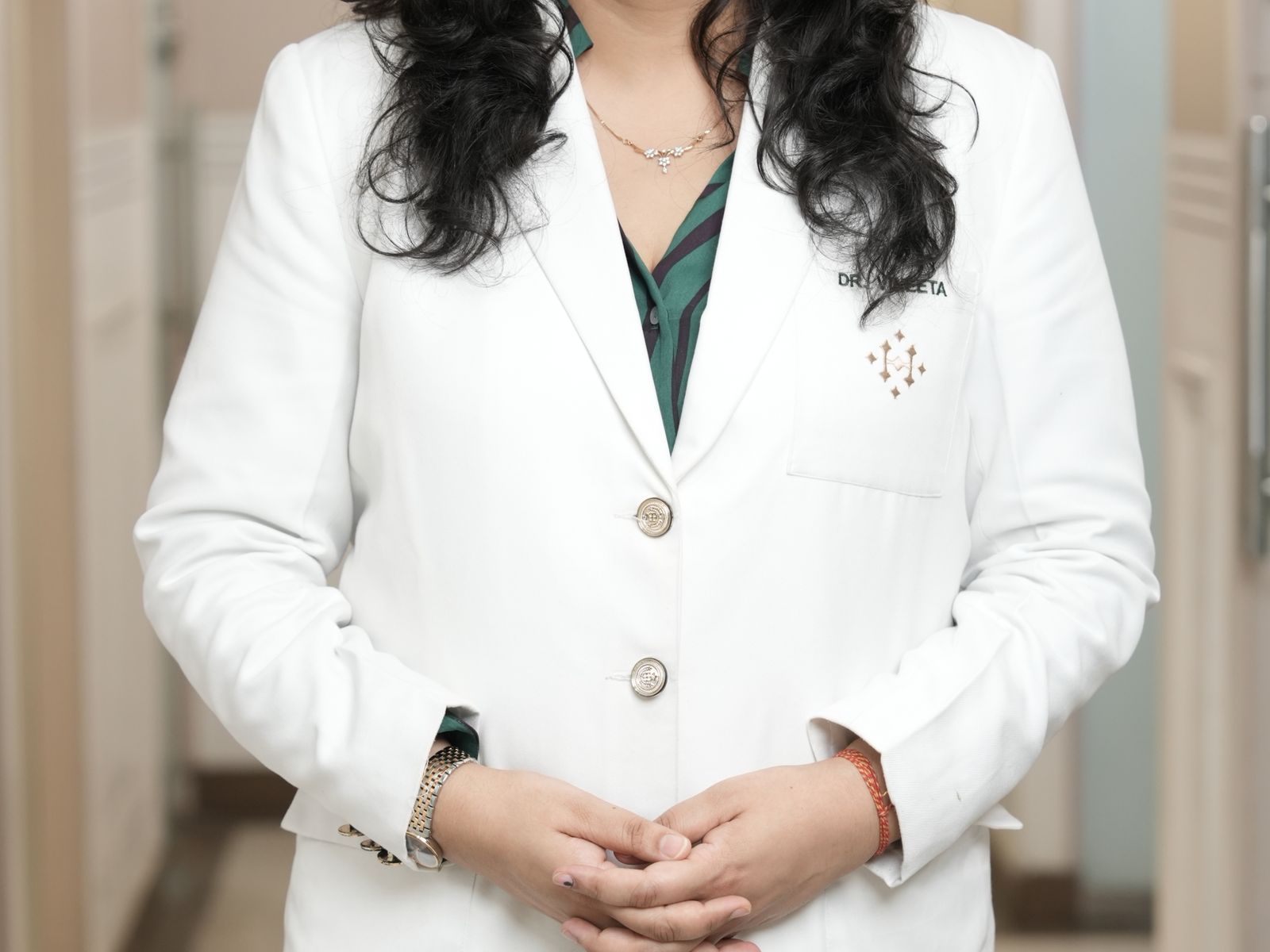 Patient and skin or aesthetics clinician in a bright modern consultation setting