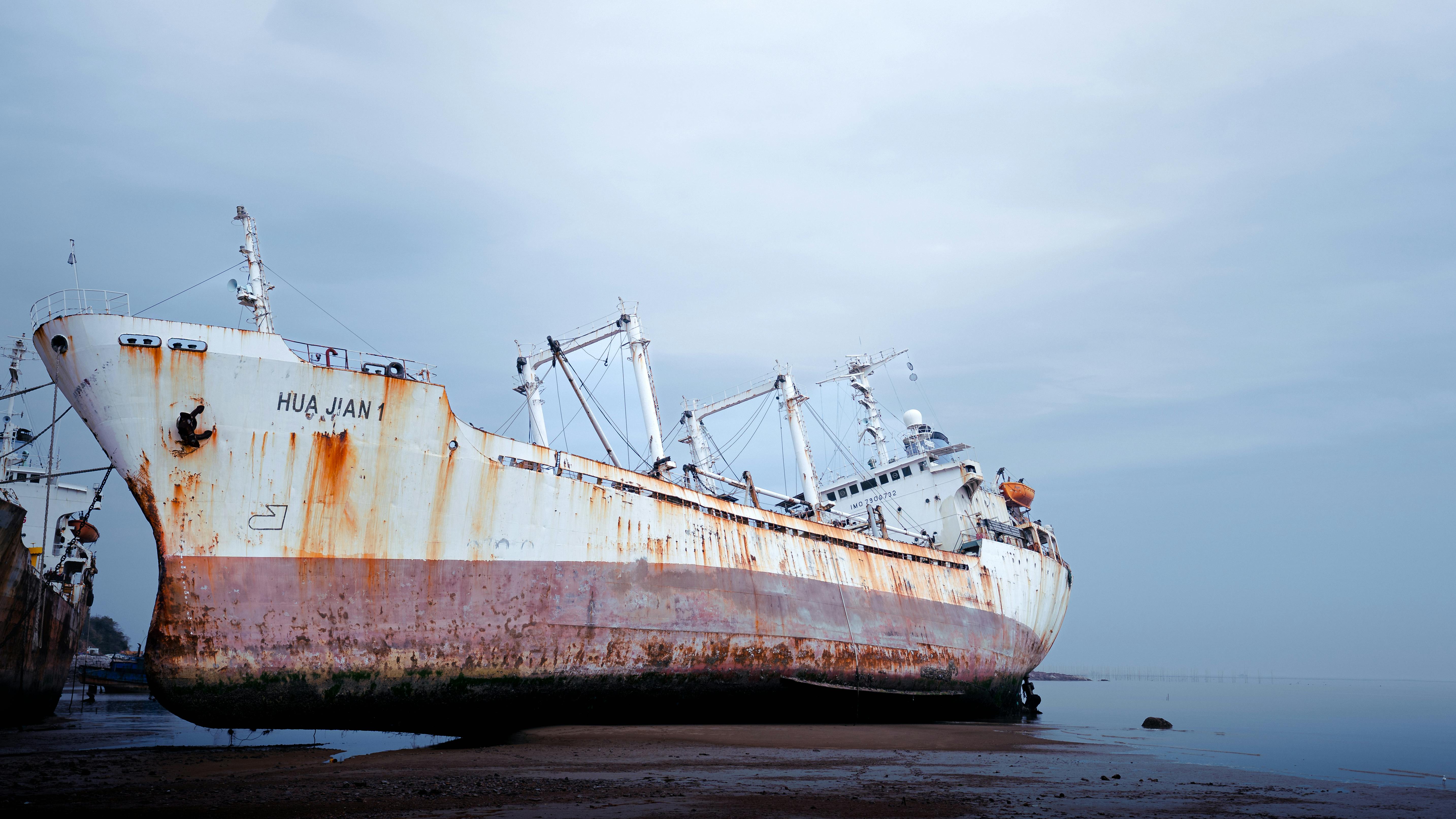 Aral Sea Ship Graveyard Landscape With Rusting Ships In A Toxic Desert