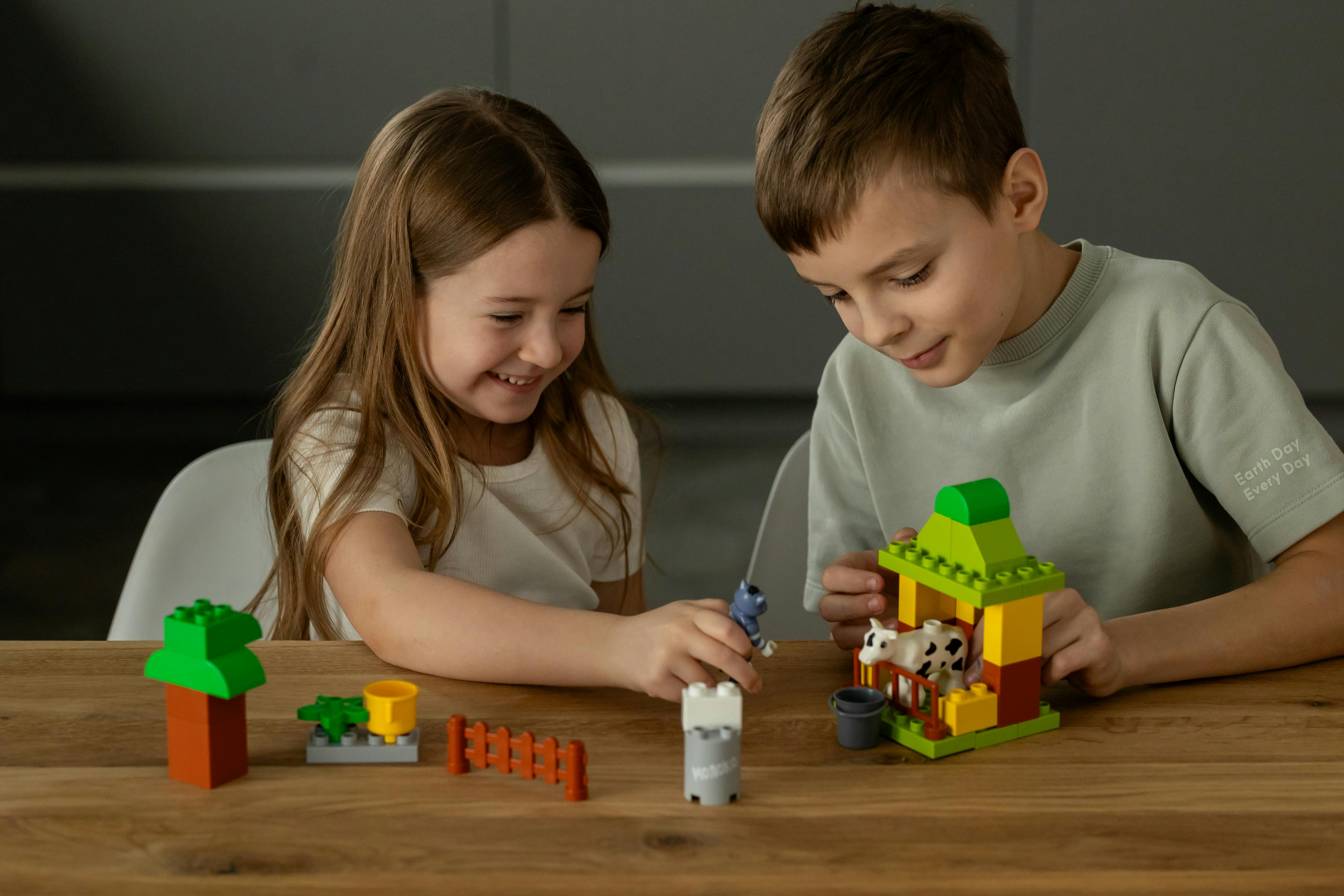 Children Playing With A Variety Of Toys And Activities, Including Both Traditionally Gendered And Non-gendered Options