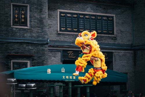 Free Colorful lion dance performance captured during a cultural festival in an Asian city. Stock Photo