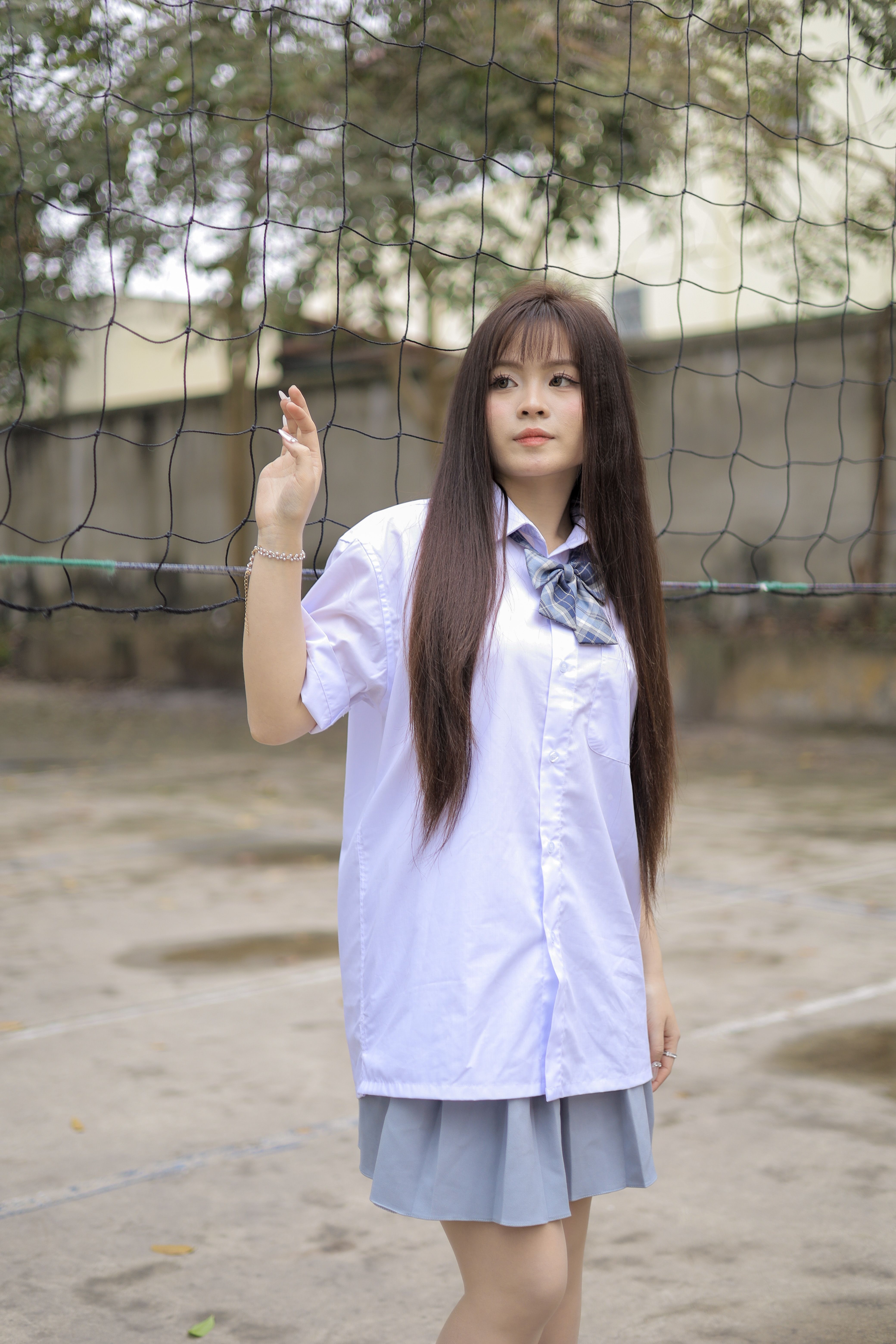 Young Woman in School Uniform Outdoors · Free Stock Photo