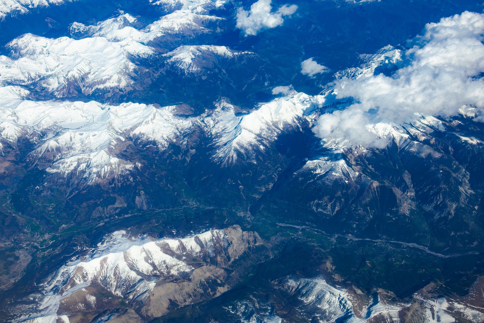 Aerial View of Snow Covered Mountains · Free Stock Photo