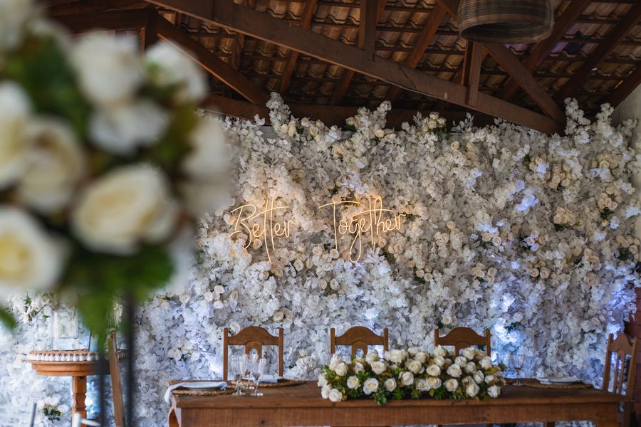 Custom floral backdrop setup at an elegant event