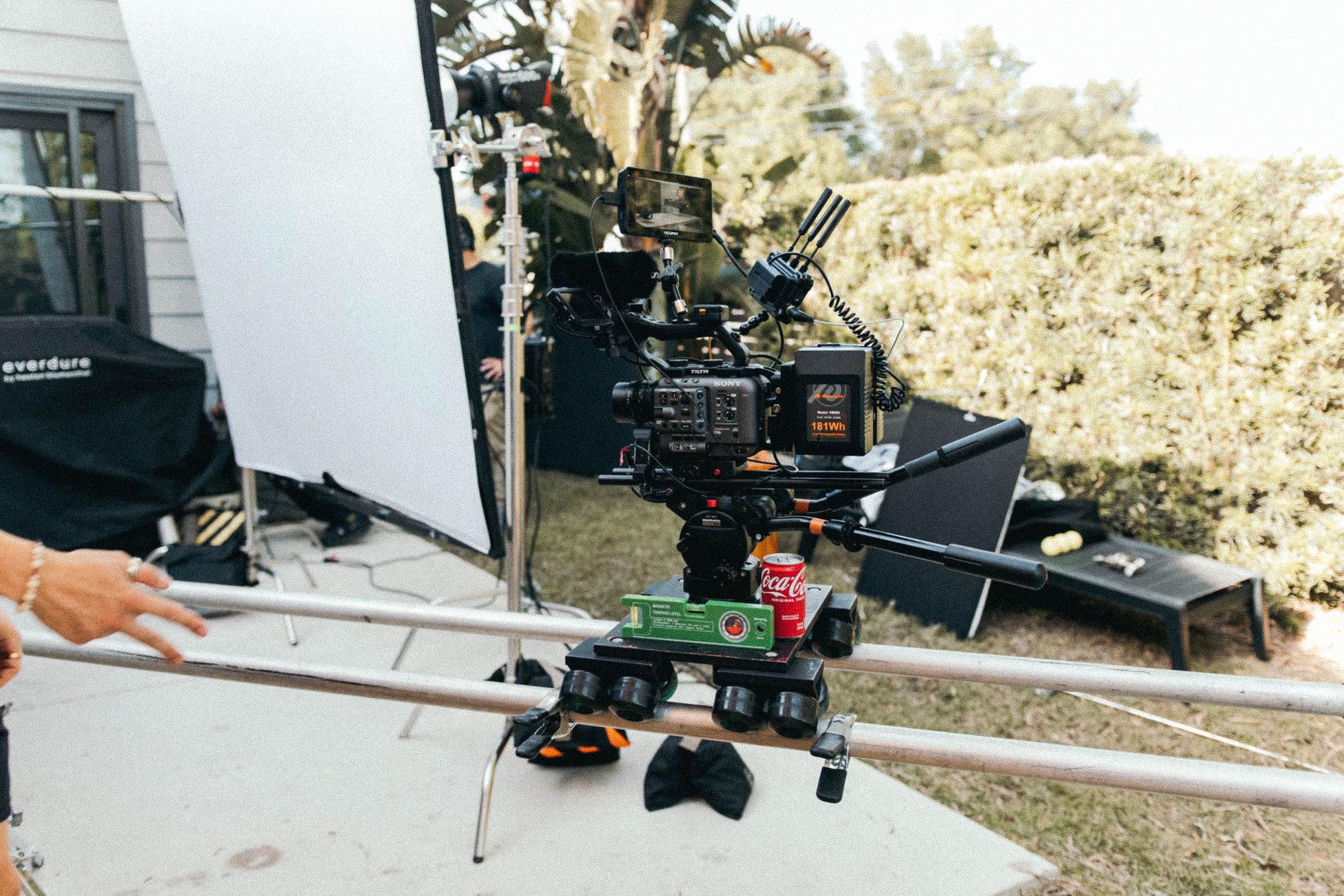 Detailed setup of a camera rig on a film set, showcasing gear and lighting in use.