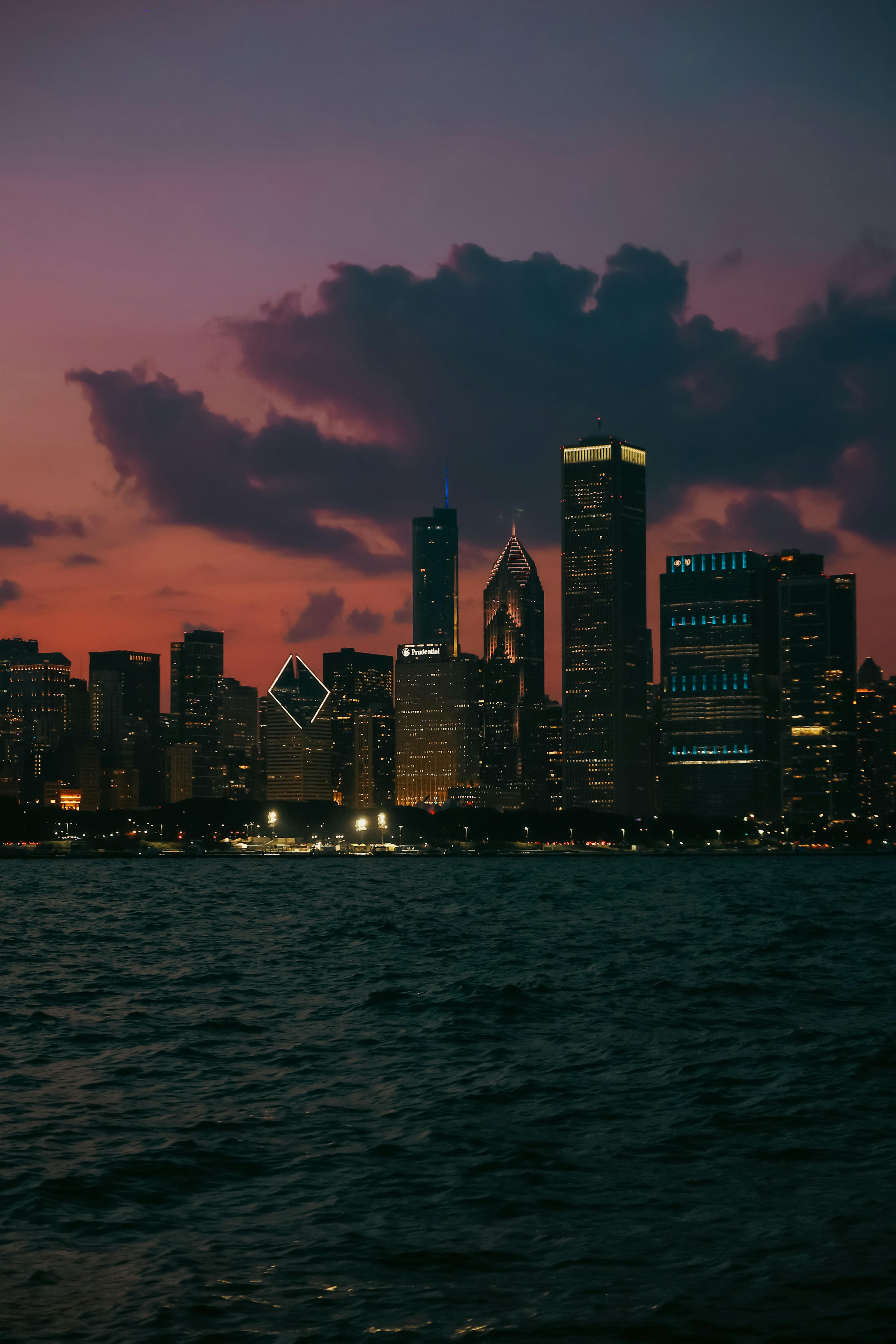 Stunning view of Chicago's skyline with vibrant dusk colors over Lake Michigan.