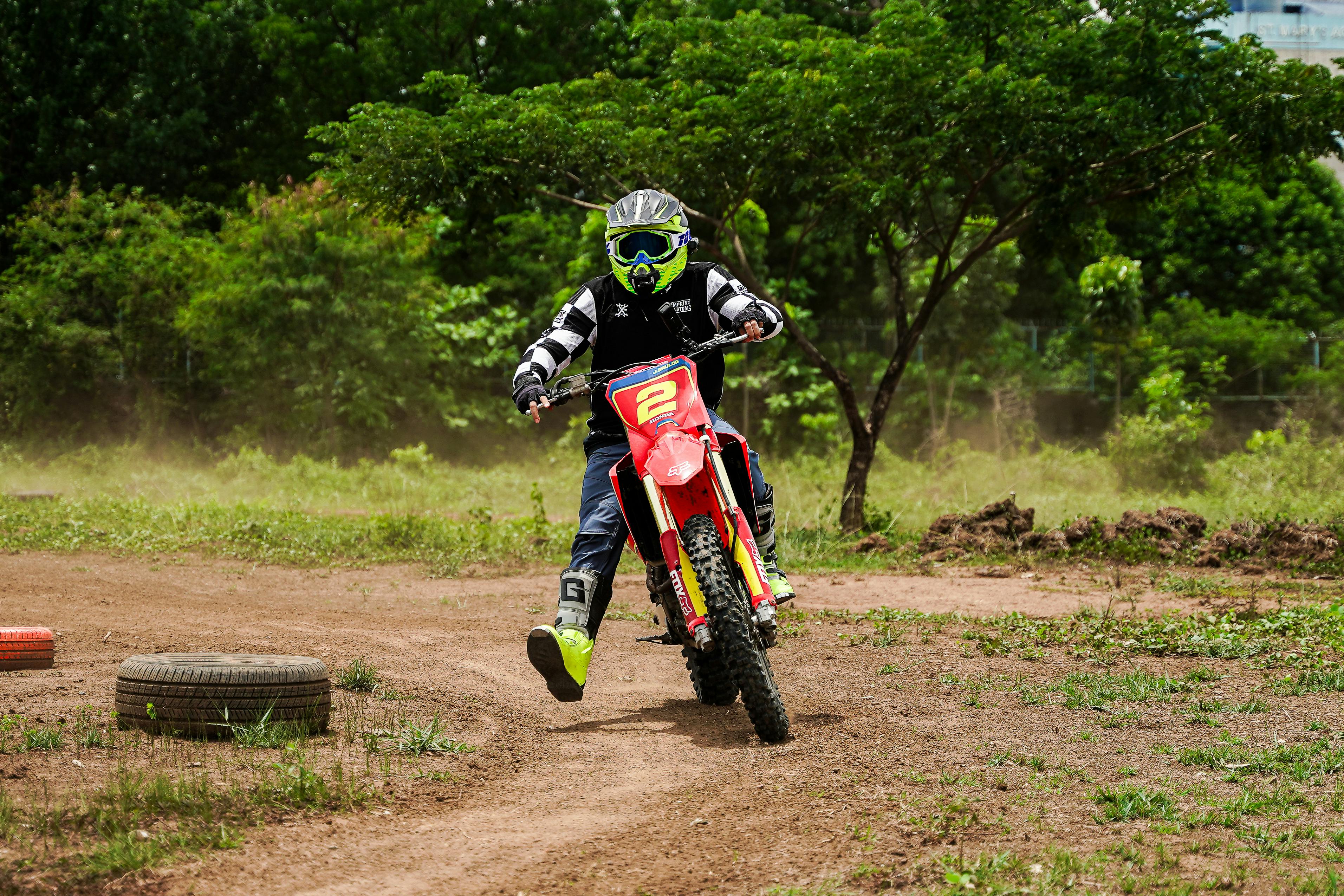 Close-up of a Filipino gambler's hand marking numbers on a PCSO lotto ticket, highlighting both frequently drawn hot numbers and less common cold numbers for strategic play.