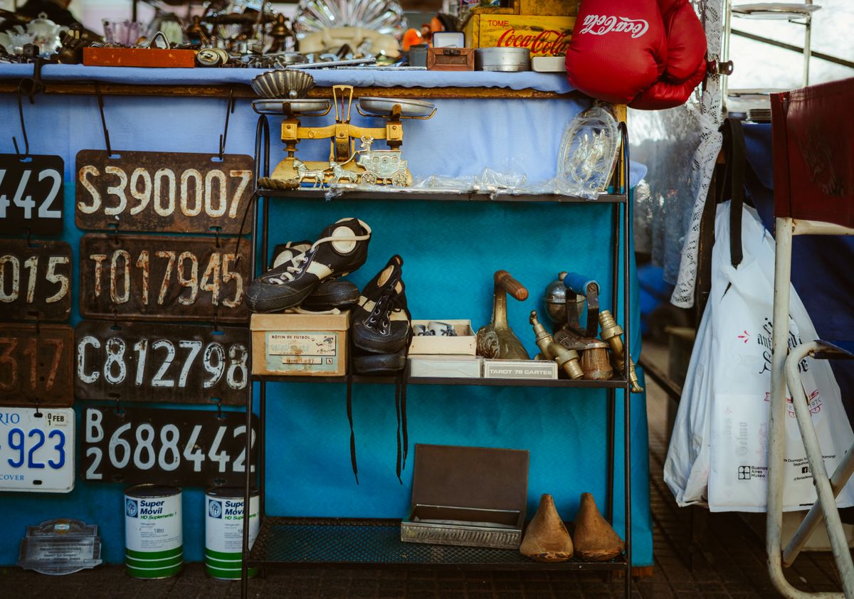 An eclectic mix of vintage items on display at a Buenos Aires market stall.