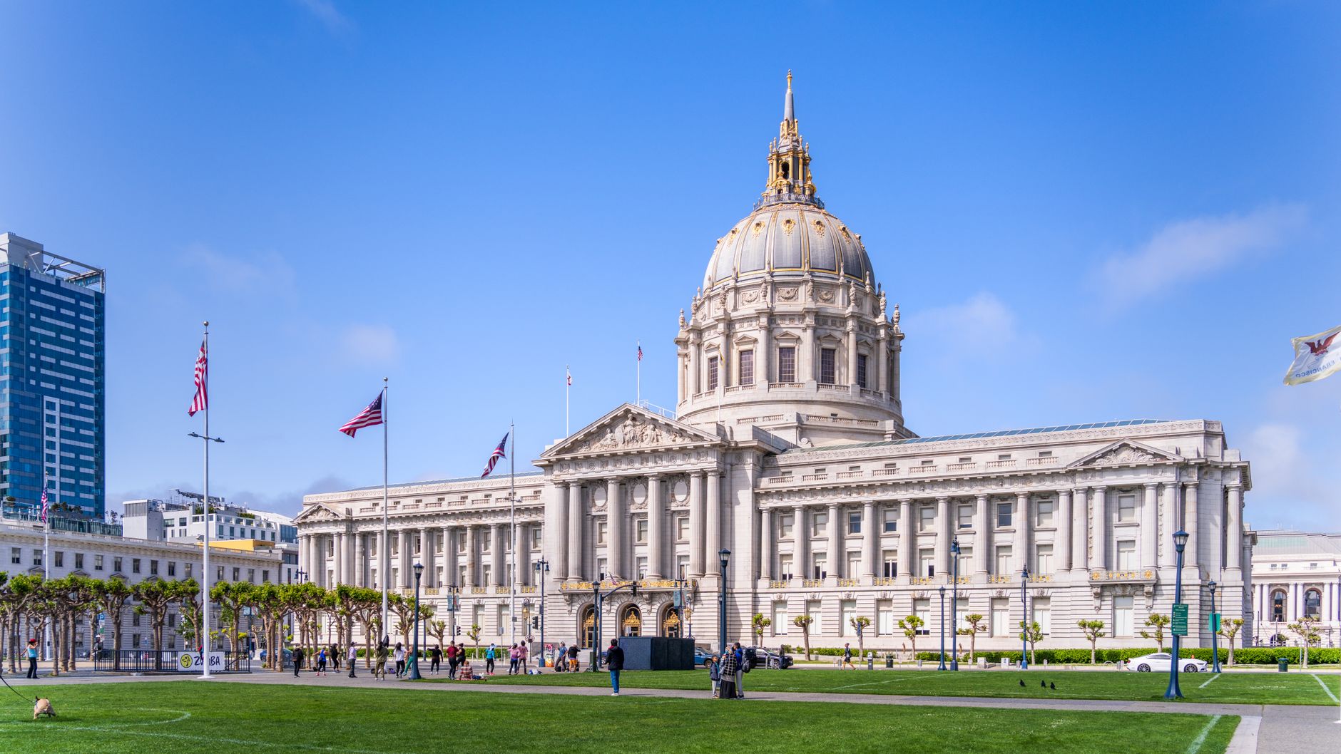 San Francisco City Hall with a classic dome under clear blue skies.