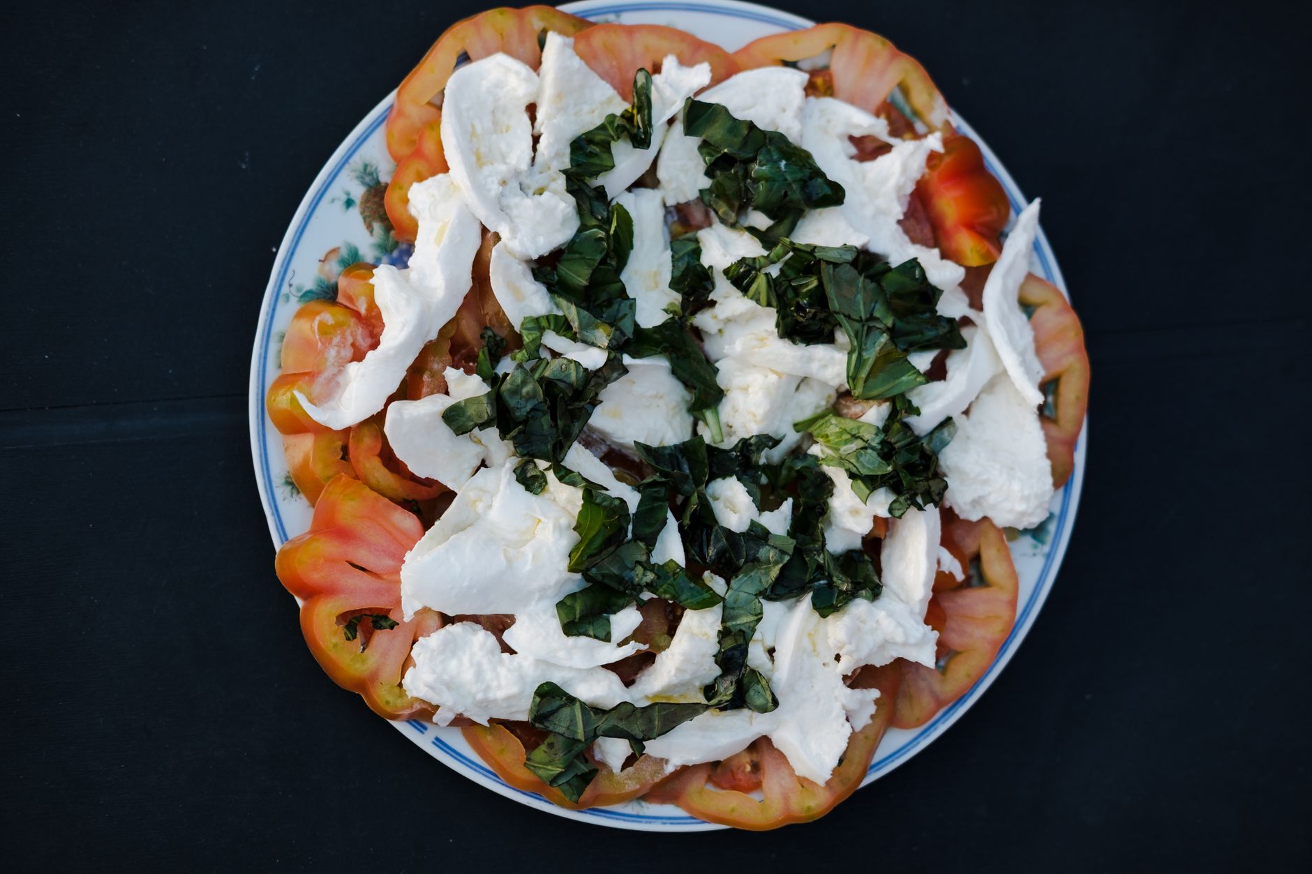 Delicious Caprese burger served with fresh ingredients