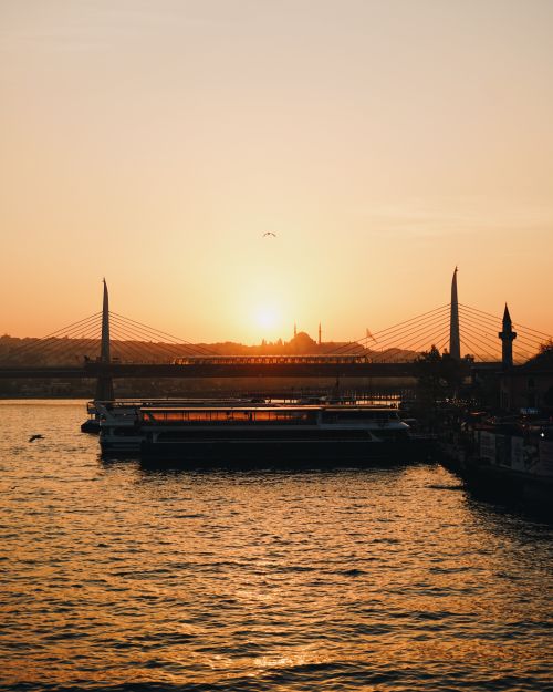 Free Stunning sunset view over Golden Horn, Istanbul with bridge and skyline. Stock Photo