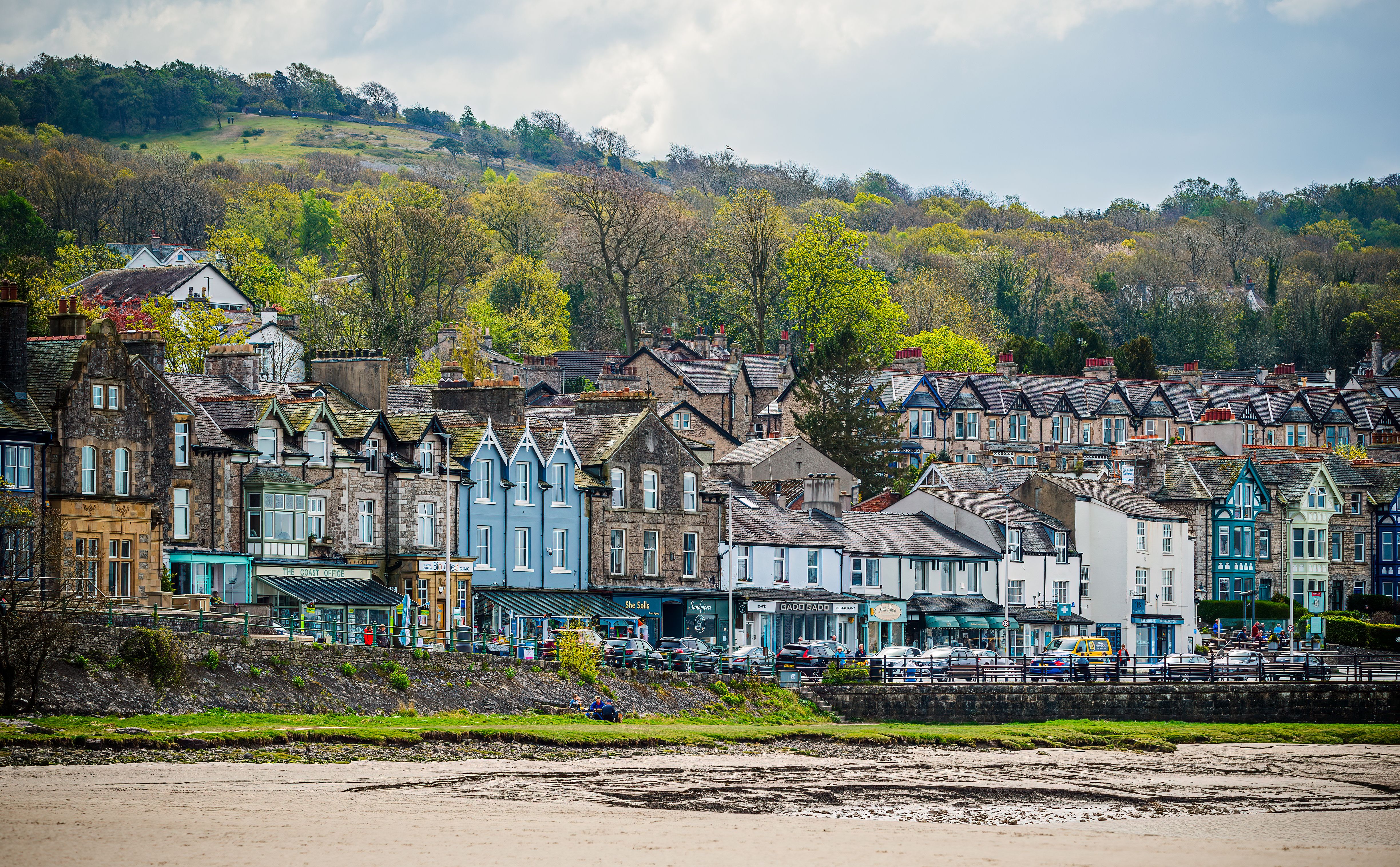 Picturesque view of Arnside with historic houses along the coast in spring.