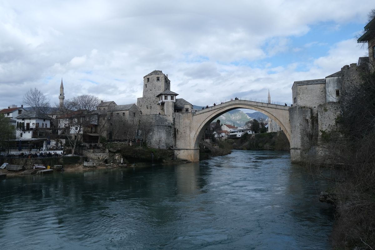 Stari Most with surrounding historic Ottoman architecture and stone buildings in Mostar