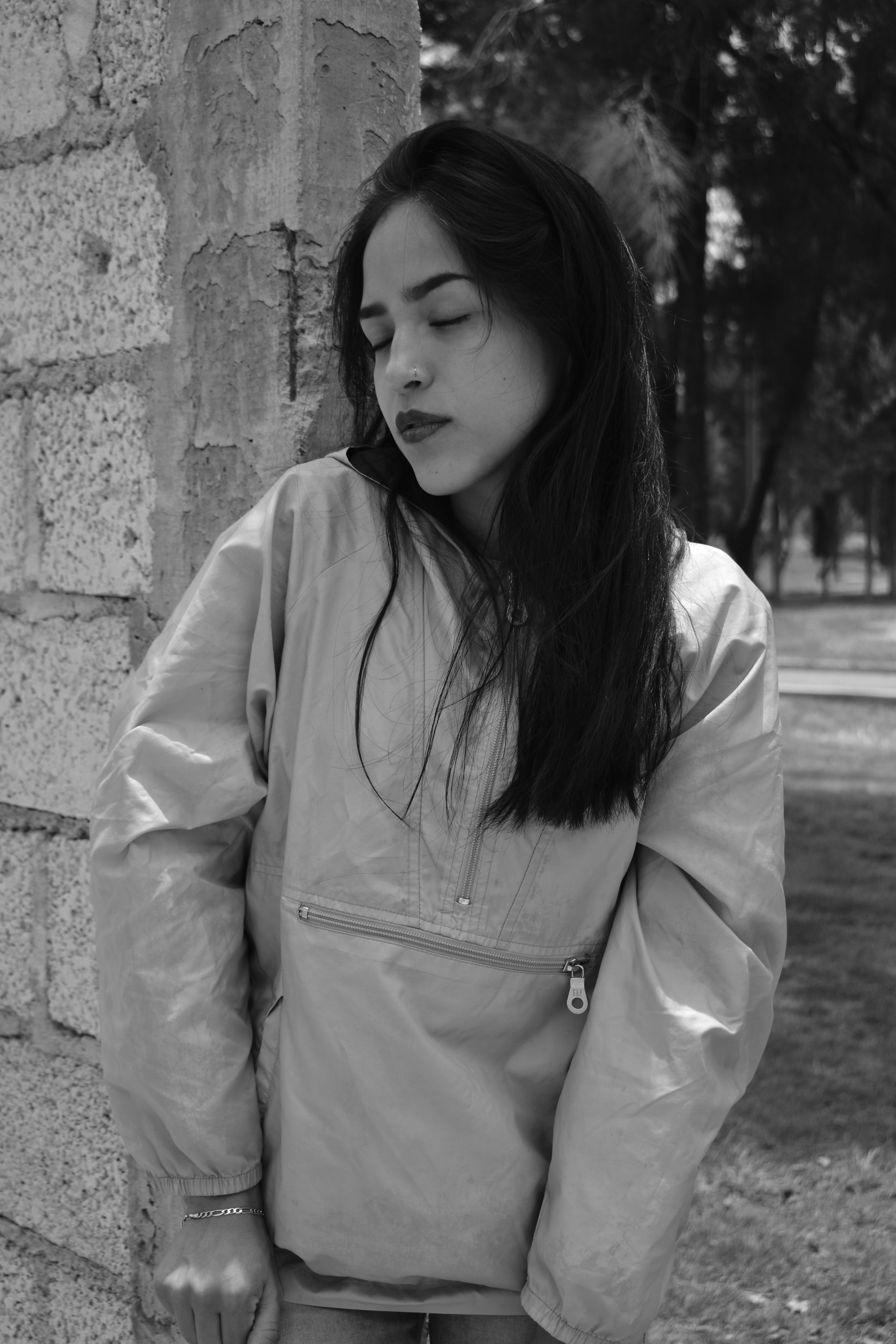 Stylish Woman in Urban Park Setting · Free Stock Photo