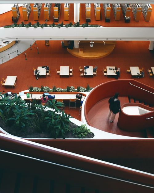 Free Aerial view of the vibrant modern interior at Toronto Reference Library. Stock Photo
